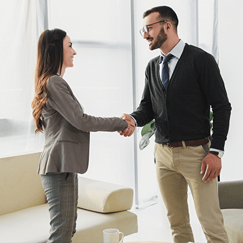 Psychologist shaking patient's hand